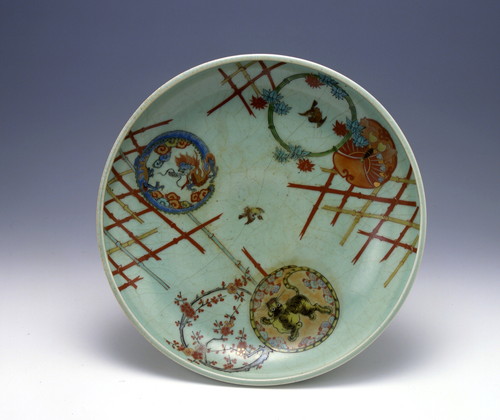 Large dish with dragon and tiger design in overglaze polychrome enamels and celadon glaze