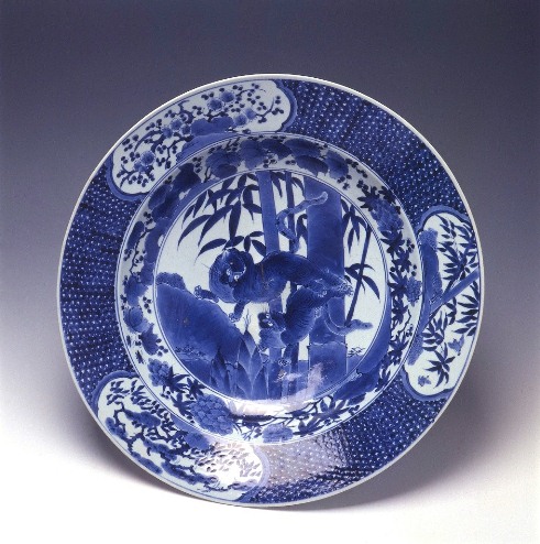 Large dish with tiger and bamboo design in underglaze cobalt blue