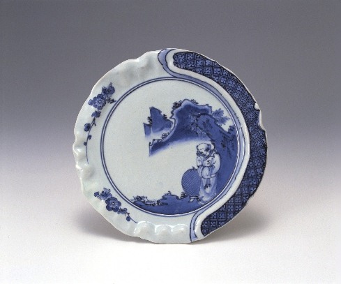 Dish with human figure and landscape design in underglaze cobalt blue