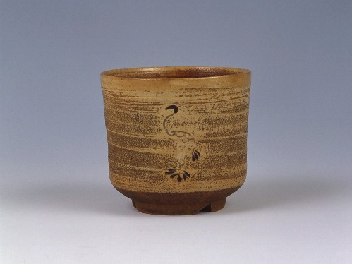Cylindrical tea bowl with standing crane design in white glaze