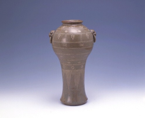 Eared bottle with inlaid design 