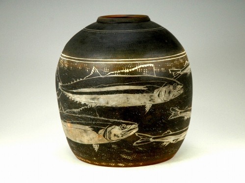 Karatsu paddled jar with inlaid fish design, entitled 'Genkai'
