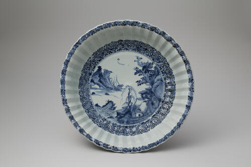 Large lobed dish with landscape design in underglaze cobalt blue