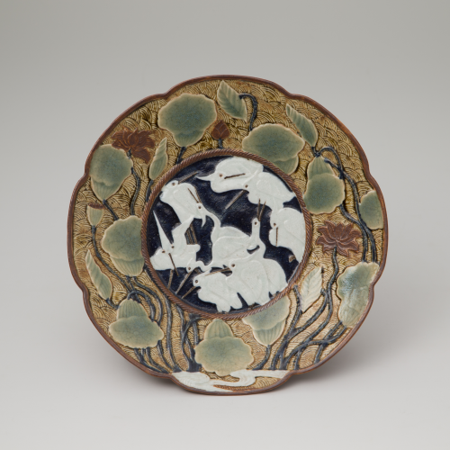 Lobed tripod dish with heron and lotus design in celadon glaze and iron and cobalt blue glaze